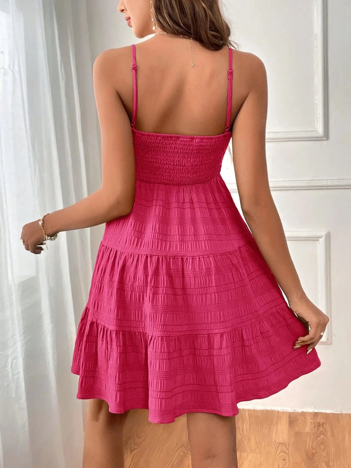 Light, feminine, and effortlessly chic — the perfect mini dress for sunny escapes.