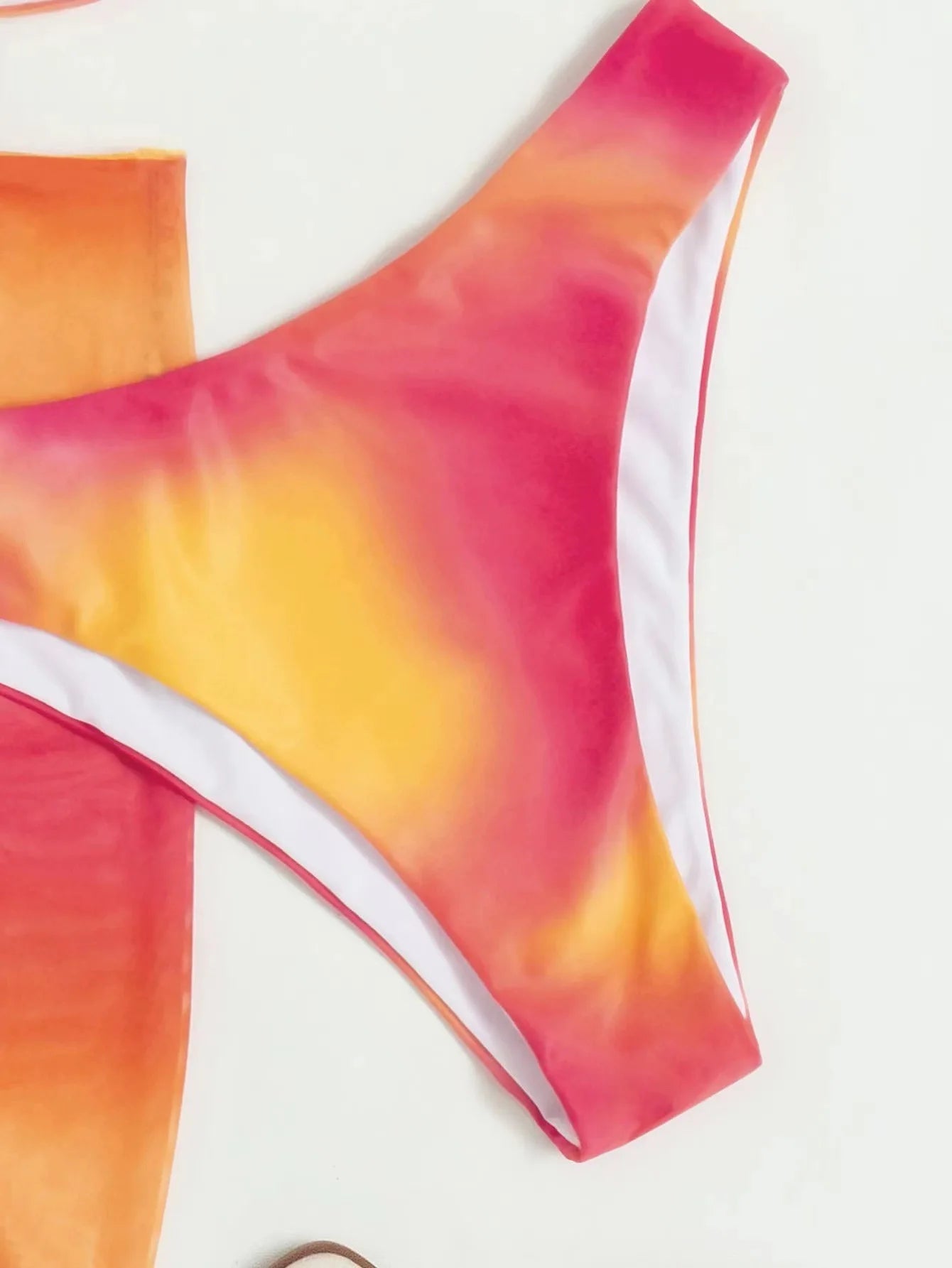Stylish Tie-Dye 3-Piece Bikini Set with Mesh Skirt. Perfect for summer!