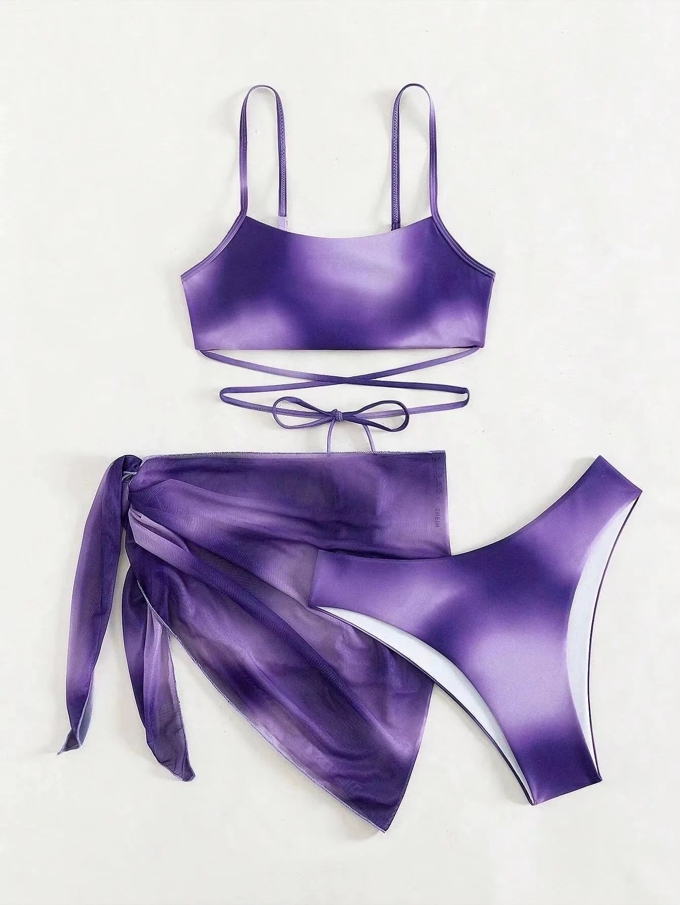 Stylish Tie-Dye 3-Piece Bikini Set with Mesh Skirt. Perfect for summer!