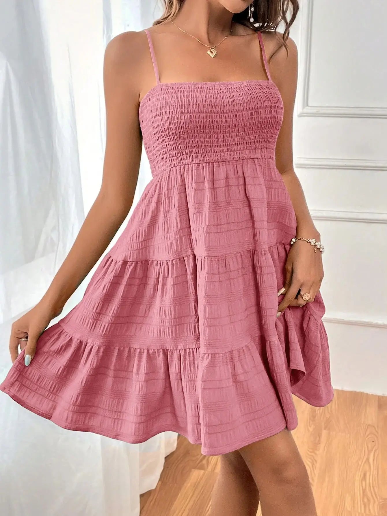Light, feminine, and effortlessly chic — the perfect mini dress for sunny escapes.