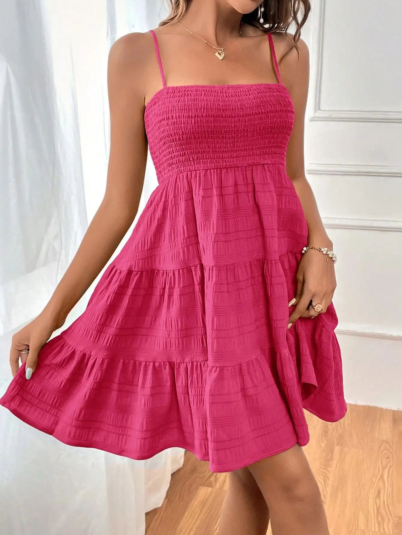 Light, feminine, and effortlessly chic — the perfect mini dress for sunny escapes.