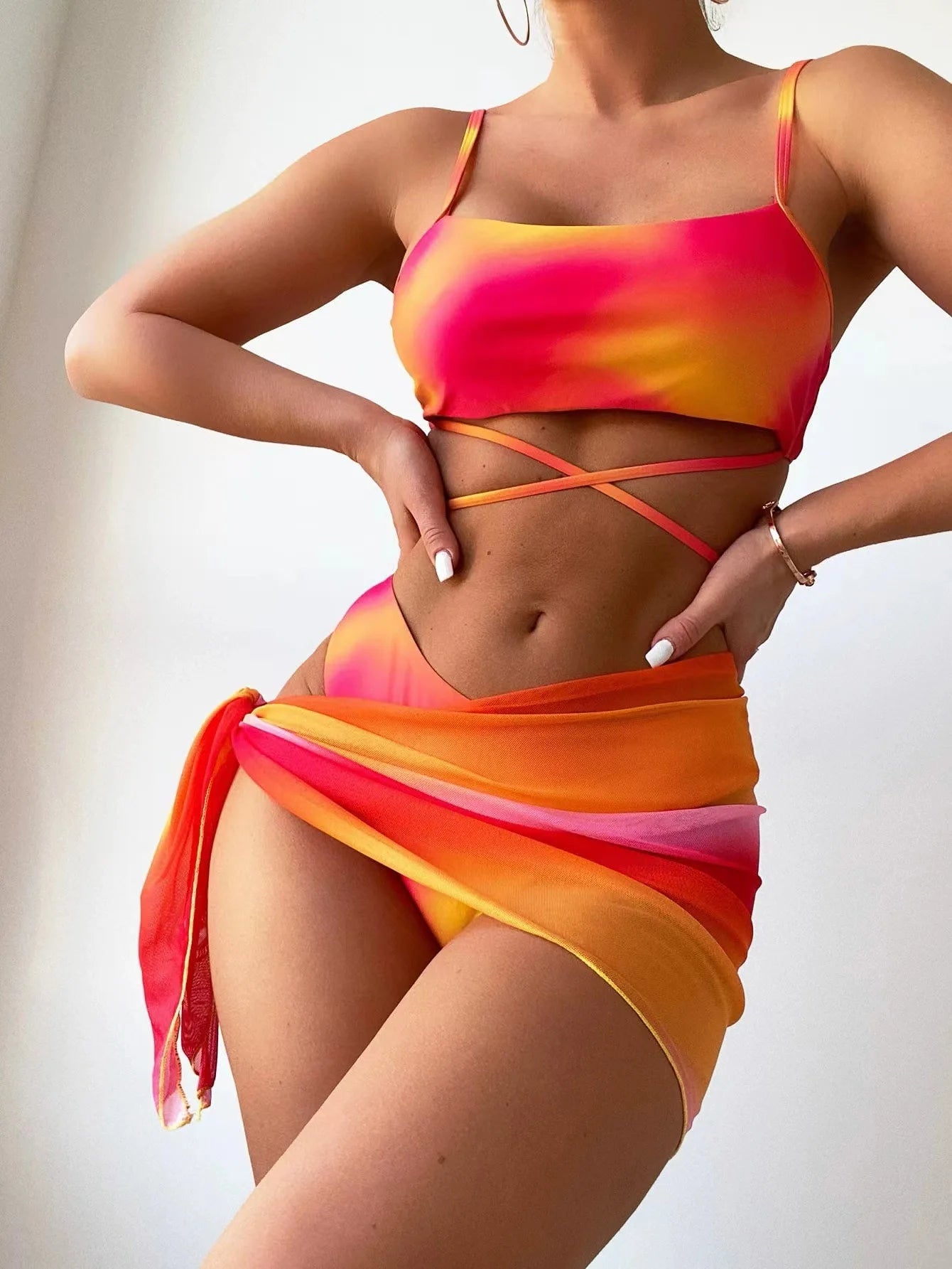 Stylish Tie-Dye 3-Piece Bikini Set with Mesh Skirt. Perfect for summer!