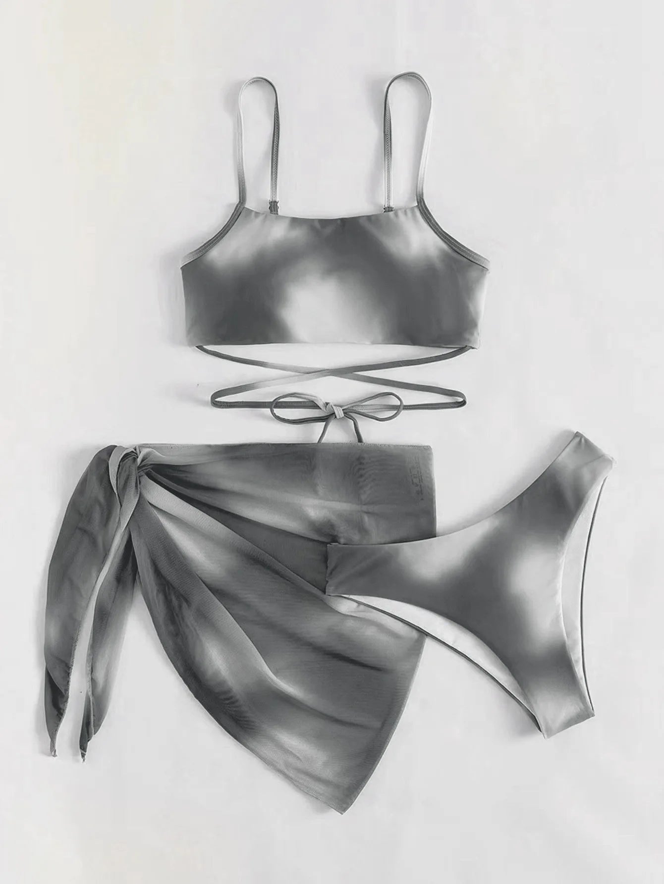 Stylish Tie-Dye 3-Piece Bikini Set with Mesh Skirt. Perfect for summer!