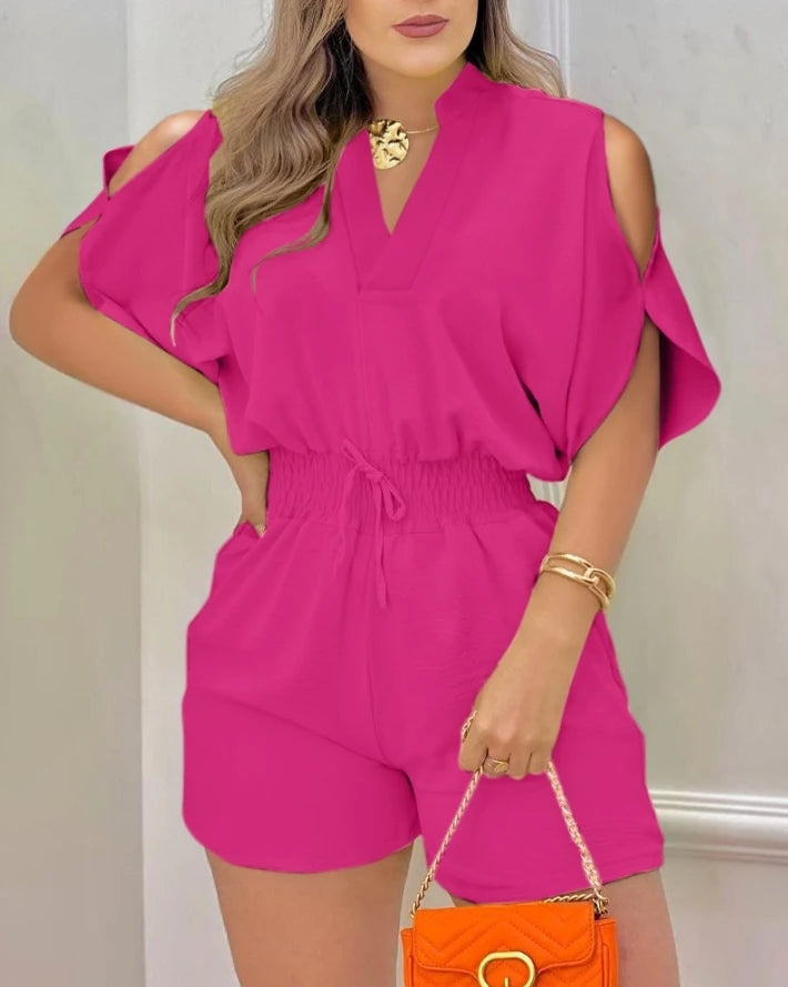 Summer 2026 elegance: cold-shoulder jumpsuit with a high waist.