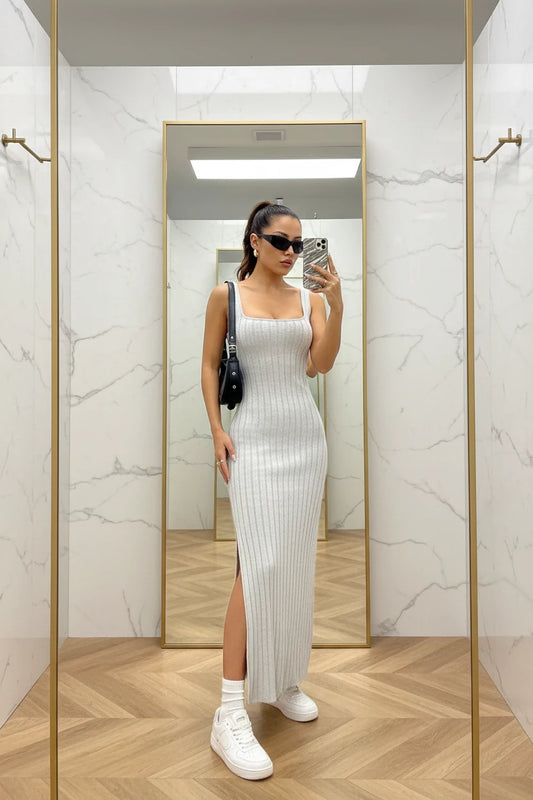 Elegant slim knitted dress with a backless design — sleek, modern, and effortlessly stylish.