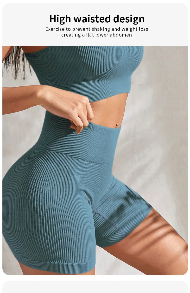 2-piece women's workout set – ribbed crop top and high-waist shorts.