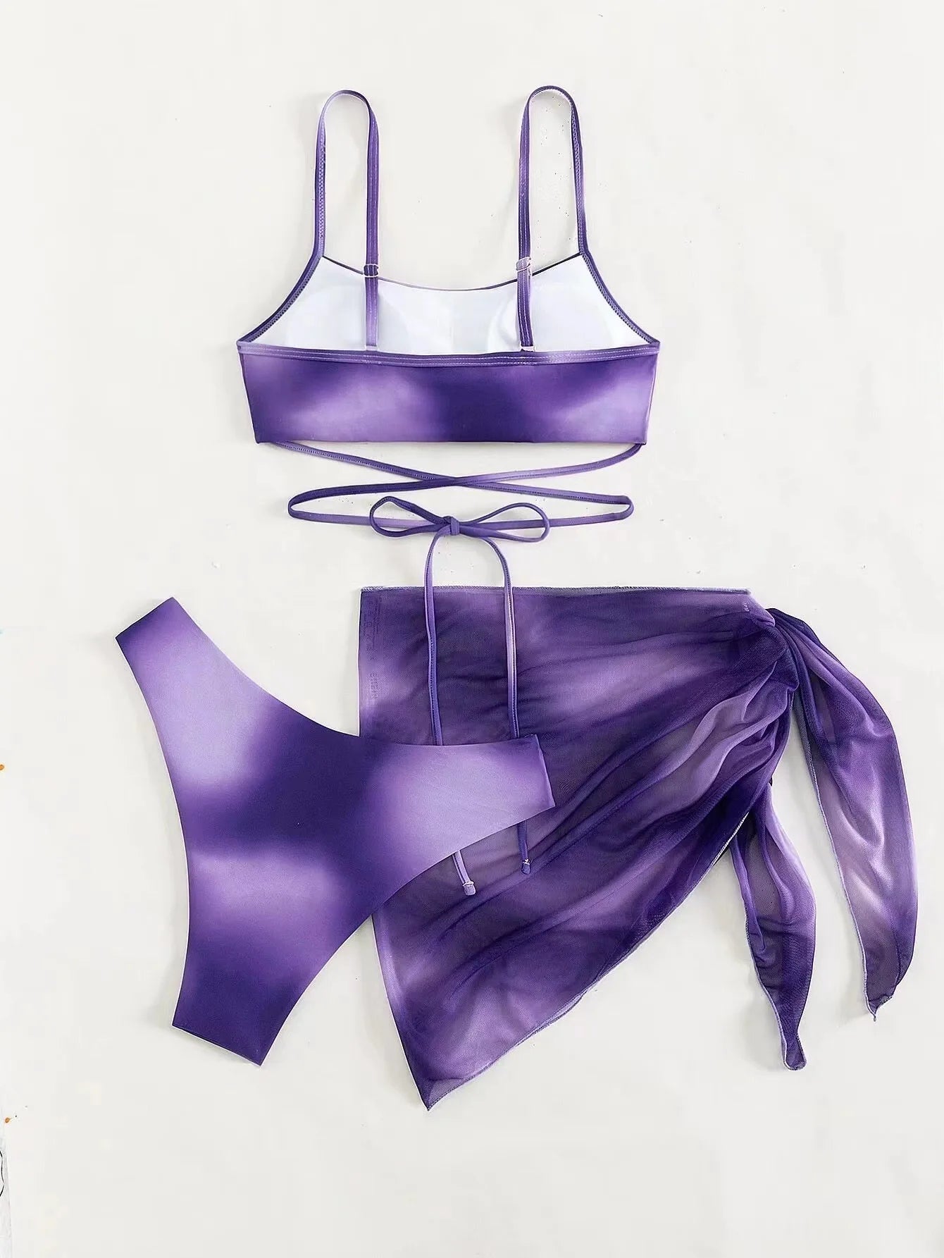 Stylish Tie-Dye 3-Piece Bikini Set with Mesh Skirt. Perfect for summer!