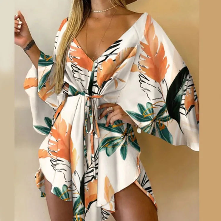 Boho Floral Mini Dress – Sexy V-Neck, Bat Sleeves & Flowy Fit for a Relaxed Summer Look.