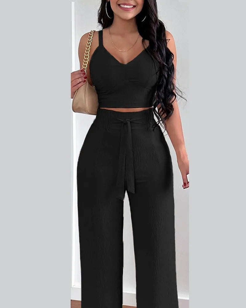 Elegant 2-piece set with a V-neck crop top and lace-up wide-leg pants — modern, flattering, and effortlessly chic.