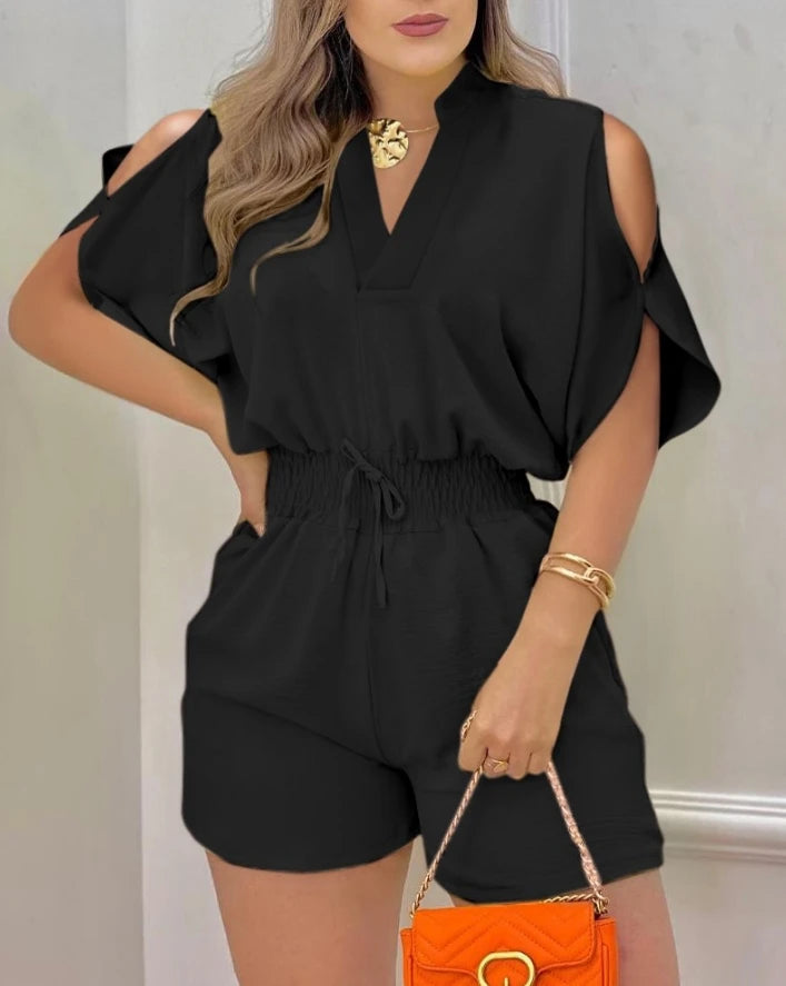 Summer 2026 elegance: cold-shoulder jumpsuit with a high waist.