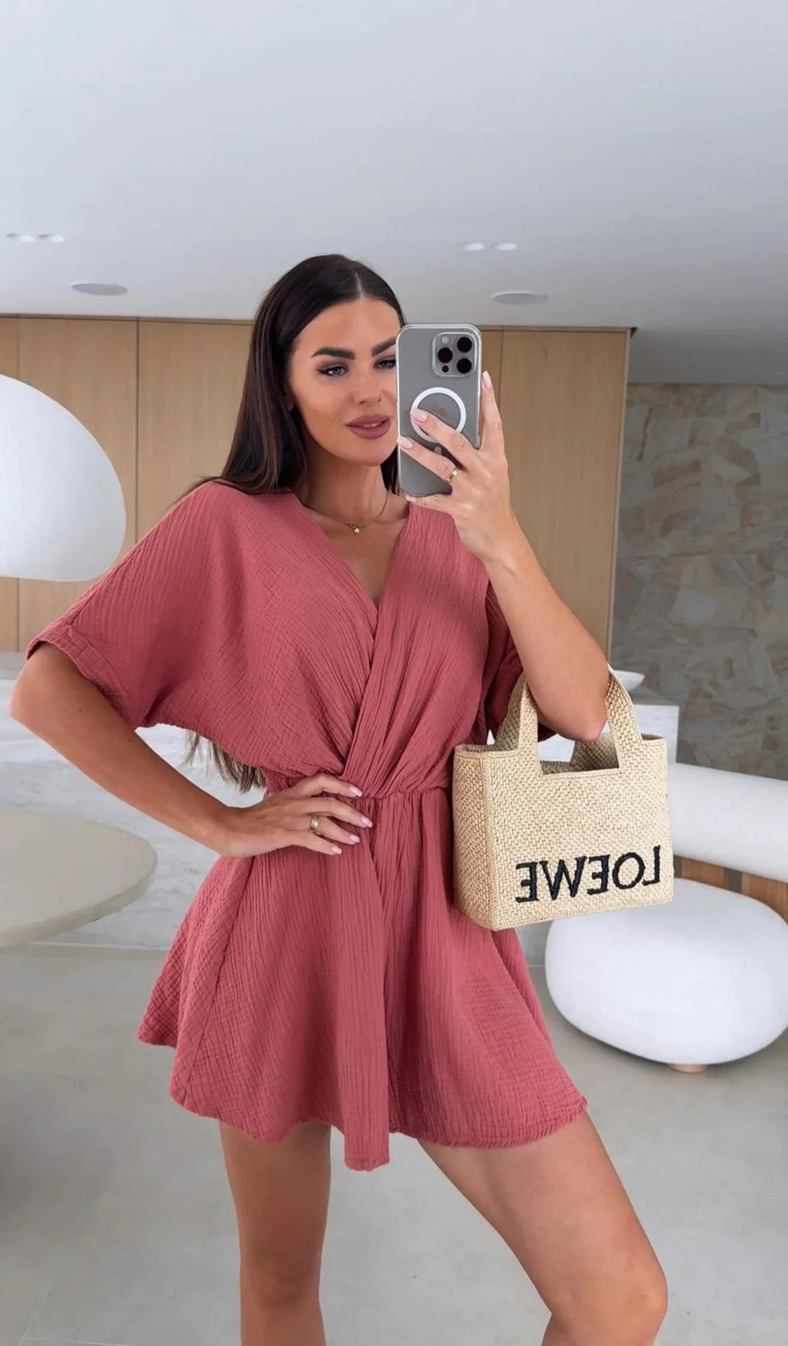 Elegant white romper with a deep V-neck and short sleeves — light, effortless, and perfect for summer days.