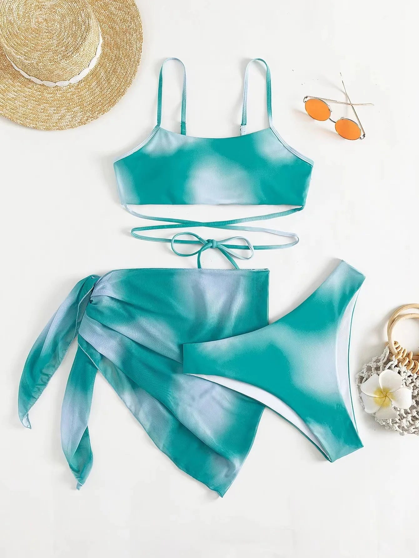 Stylish Tie-Dye 3-Piece Bikini Set with Mesh Skirt. Perfect for summer!